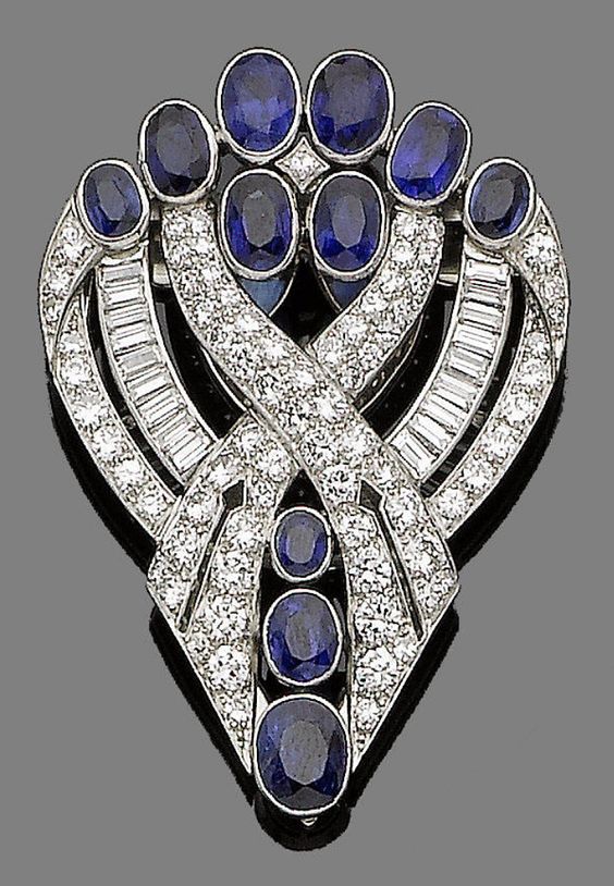 An art deco sapphire and diamond clip brooch, by J R Ogden & Sons, circa 1935.