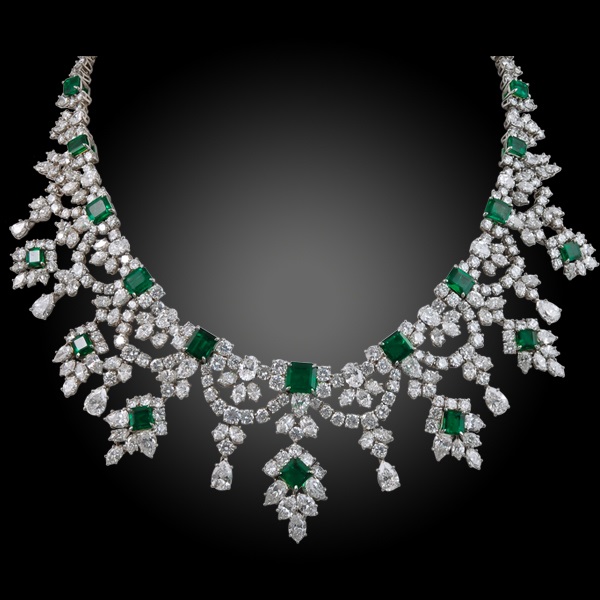 Vintage platinum diamond and Colombian emerald necklace, weighing 16 carats of diamonds and 75 carats of emerald, signed Harry Winston, circa 1970s. 