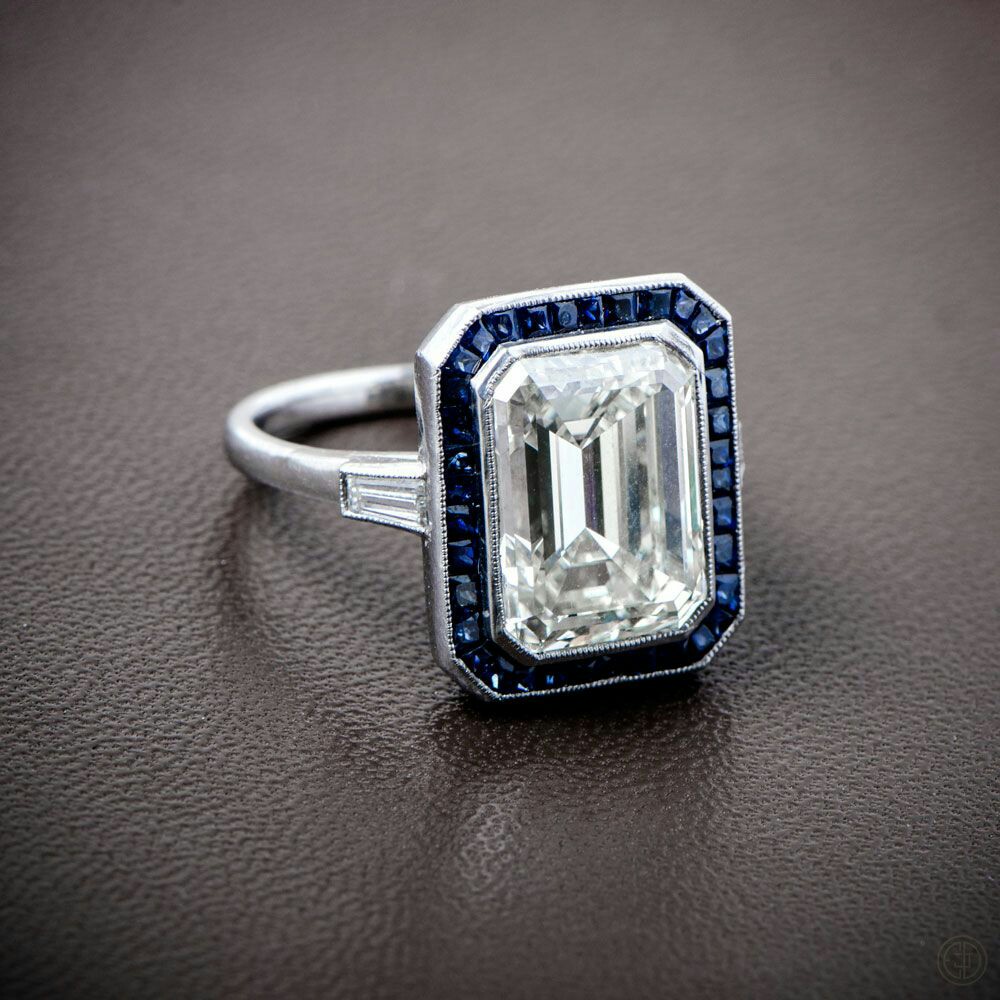 Gorgeous Emerald Cut Diamond and Ceylon Sapphire Halo Ring