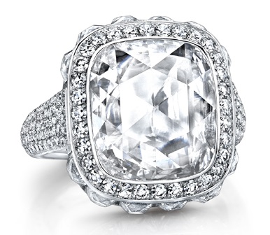 Cushion rose-cut diamond of 4.38 carats; surrounded by 12 French-cut diamonds of 2.87 carats; and micro-set with 302 brilliant round diamonds on the band. Set in platinum.