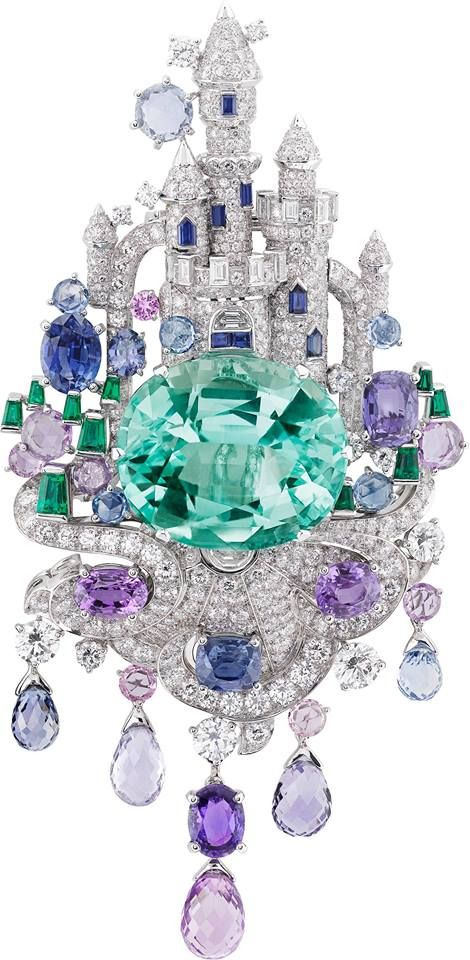 Van Cleef & Arpels' Château Enchanté clip, Fantasy castle created with diamonds and multi-colored sapphires, sitting atop an oval-cut Brazilian paraiba tourmaline of 39.85 carats. 