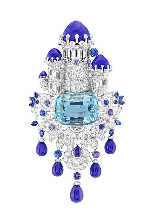 Van Cleef & Arpels' Château Enchanté clip, Fantasy castle created with diamonds and tanzanites, sitting atop an beautiful Brazilian aquamarine gem. 