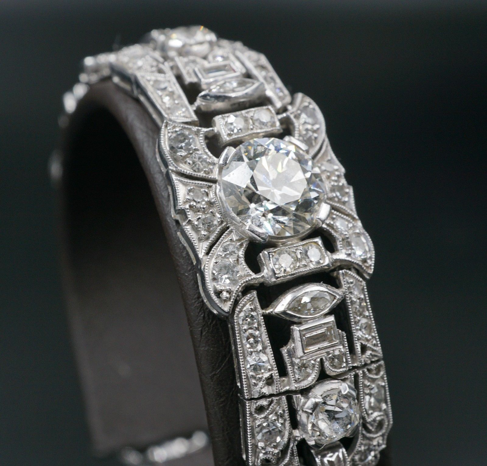 Bracelet: Edwardian era Art Deco design open filigree natural diamond link design, fastening with a fold-over locking clasp with safety chain | 205 diamonds | 8.91 carats |Appraisal: $110,500