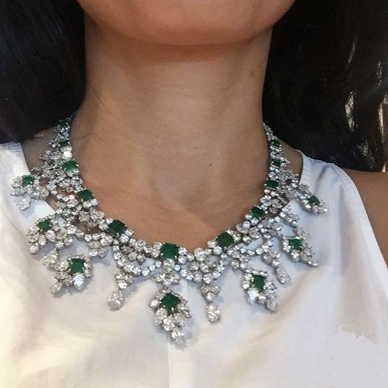 Vintage platinum diamond and Colombian emerald necklace, weighing 16 carats of diamonds and 75 carats of emerald, signed Harry Winston, circa 1970s. 