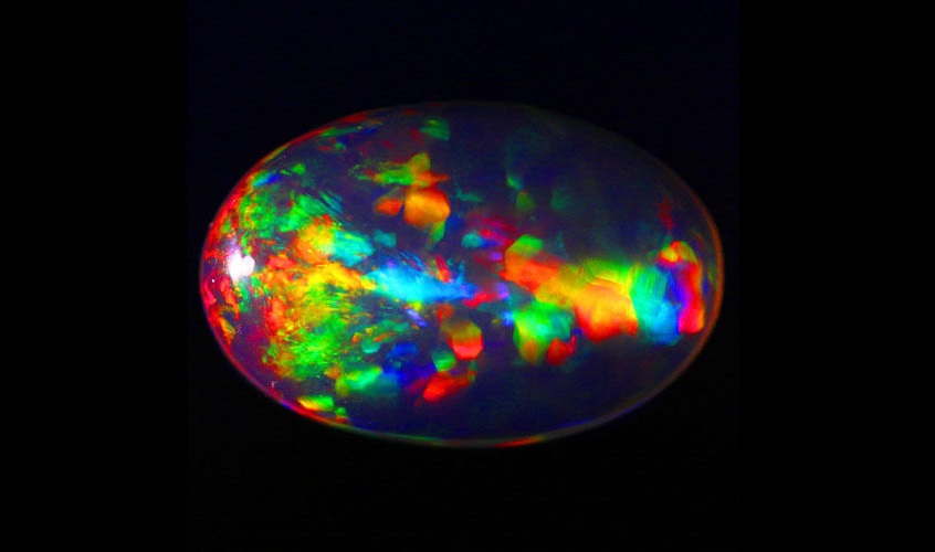 A Gorgeous multiple color 24.045 ct Ethiopian Opal Gem