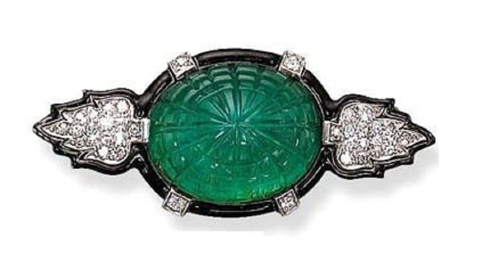 A Fine Art Deco emerald, diamond and enamel brooch, by Cartier