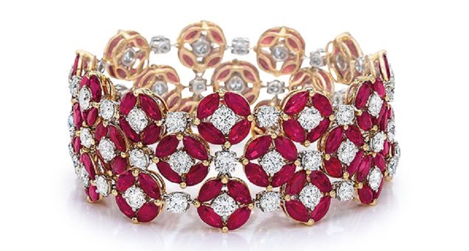 Ruby and Diamond Bracelet - 3-row bracelet of marquise-shape rubies, in clusters of 4, forming circles with a round brilliant-cut diamond at each center, in a pattern with diamonds as connectors; in 18-karat rose gold. Dimensions: approx. 1" wide x 6 5/8" long. / Cellini Jewelers.