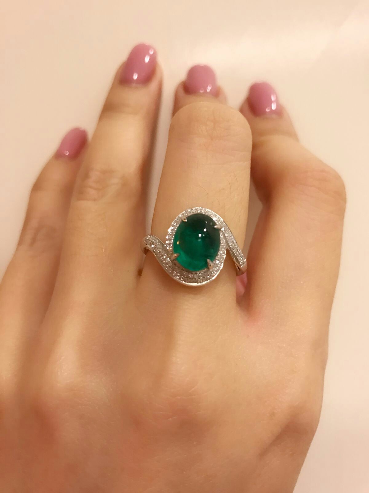 A Wonderful Cabochon Cut Colombian Emerald and Diamond Ring
