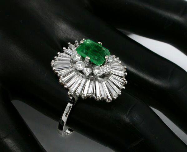 REVIEWS:  yelp reviews      prev    next  1.50ct EmeraldDiamond 14k White Gold Ballerina Ring        1.50ct Emerald Cut Emerald 2.20ct Diamond Gold Ballerina Ring 1.50ct EmeraldDiamond 14k White Gold Ballerina Ring Item: 91321PASSPrice: $2,700 Carats: 1.50 Metals: 14k gold    This is a wonderful 14 white gold ballerina ring. The ring features a ballerina design and is centered by a gorgeous emerald cut emerald that weighs approximately 1.50ct. The emerald reveals vivid green color and brilliance. This center stone is accentuated by sparkling round and baguette cut diamonds that weighs approximately 2.20ct. The color of the diamonds is H with VS clarity. The top of this ring measures 20mm by 18mm by 15mm. 