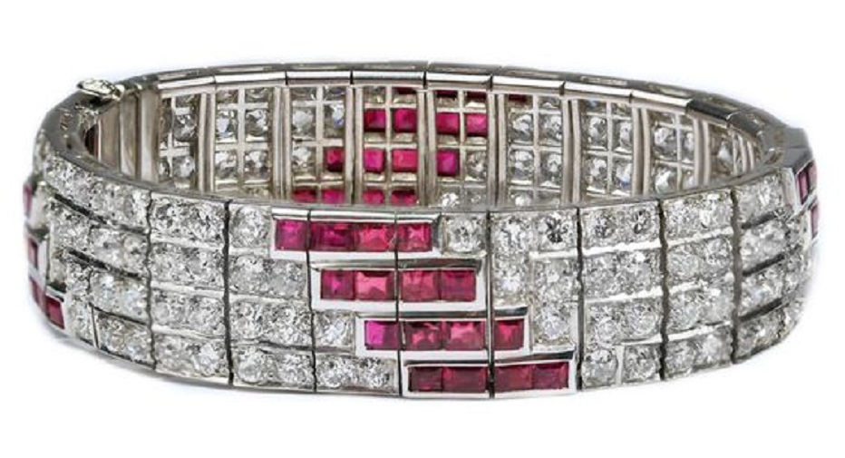 Ruby and Diamond Art Deco Platinum Bracelet, accompanied by approximately 13.00 carats of Diamonds and 4.00-5.00 carats of Rubies. Set in Platinum.