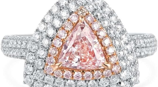 GIA Certified 0.81 Carat Triangle Fancy Light Orangy Pink Color Diamond Set In 18k White Gold Ring By Astteria